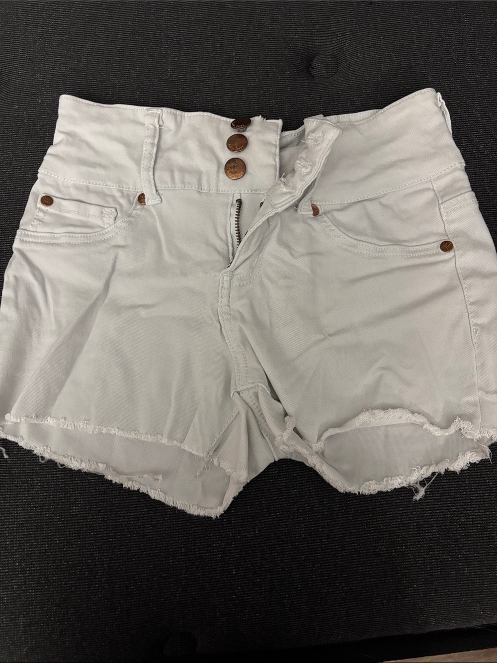 High-Rise White Denim Cutoff Shorts with Triple Button
